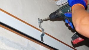 Building contractor Installing garage door opener